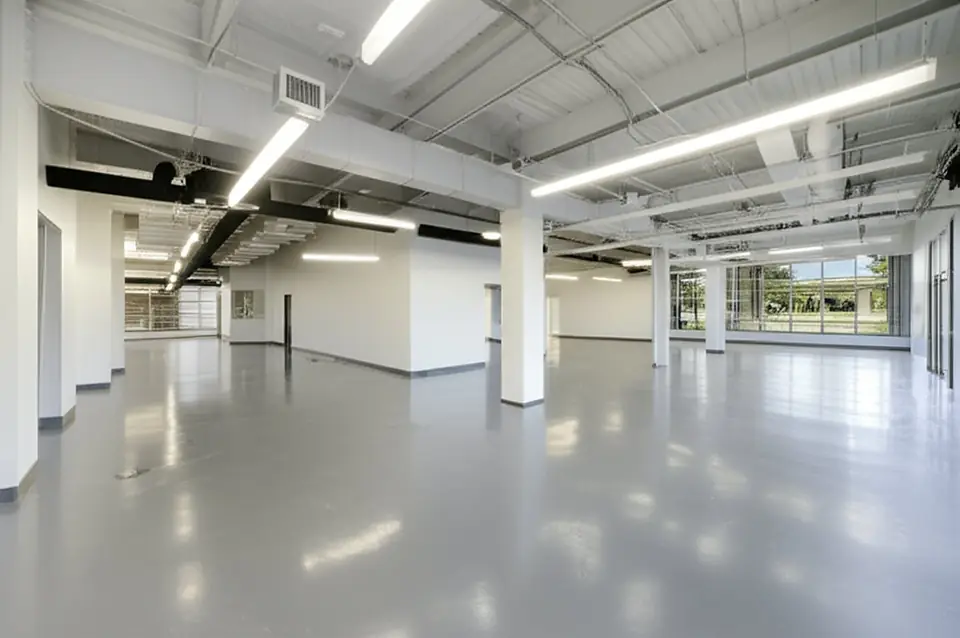 The 8,000 SF front suite and showroom at 717 Monument Street, Danville — open floor with street-facing windows.