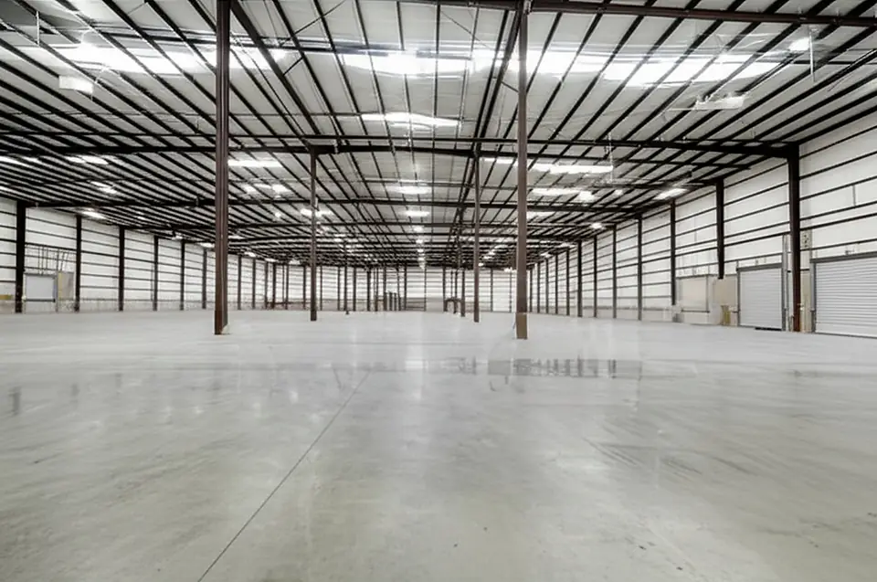 Inside the 14,000 SF warehouse at 717 Monument Street, Danville — open floor under high ceilings.