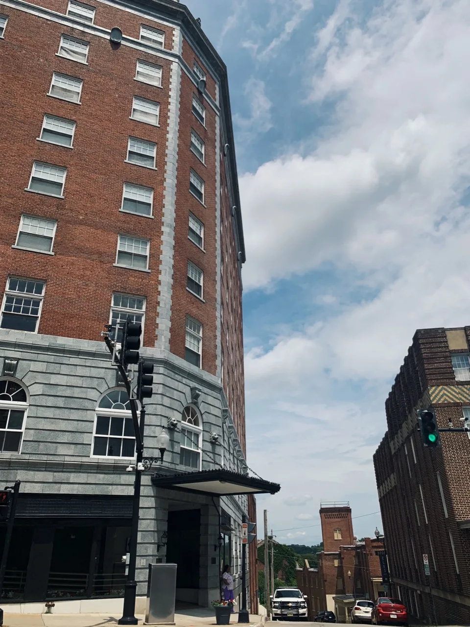 The 1927 Hotel Danville tower photographed from the street corner, looking up past a street lamp.