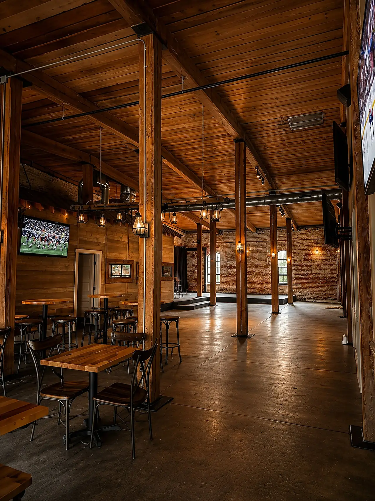 Main dining and sports room with stage.